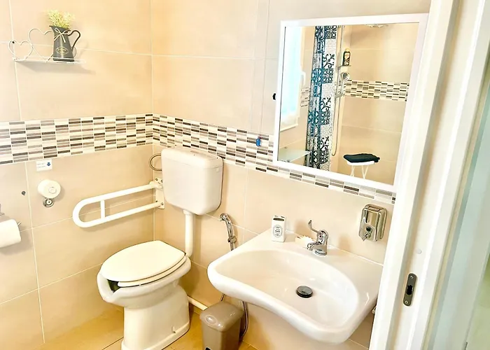 In 4* Комизо
